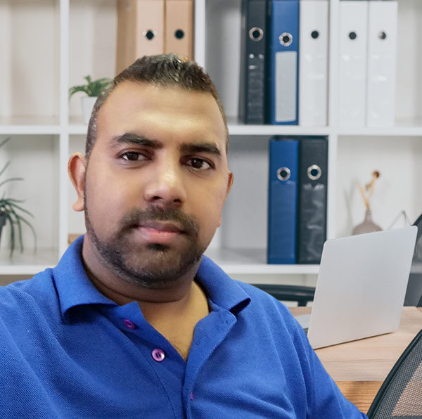 Portrait of Mukesh Ram, church website designer featured on the About Us page